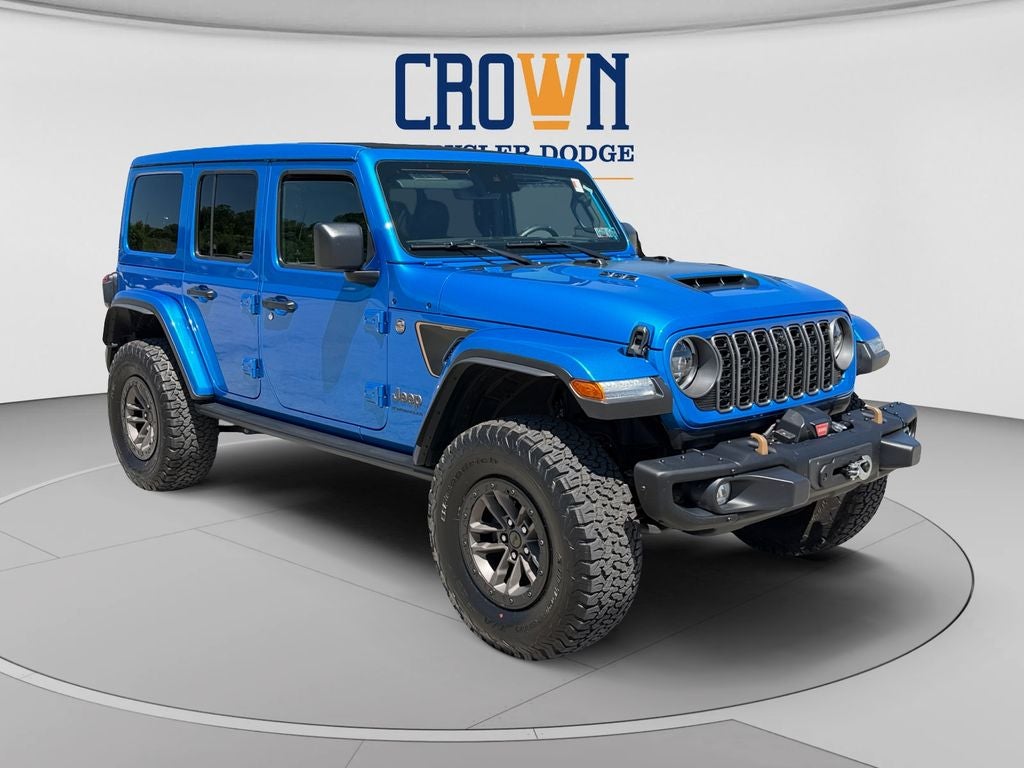 2025 Jeep Wrangler Rubicon 392 in Hydro Blue Pearl Coat — front three-quarter view