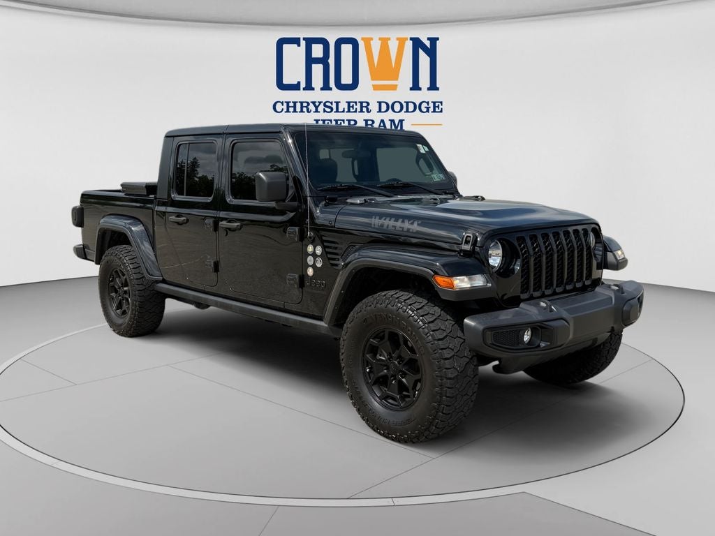 2023 Jeep Gladiator Willys in Black Clearcoat — front three-quarter view