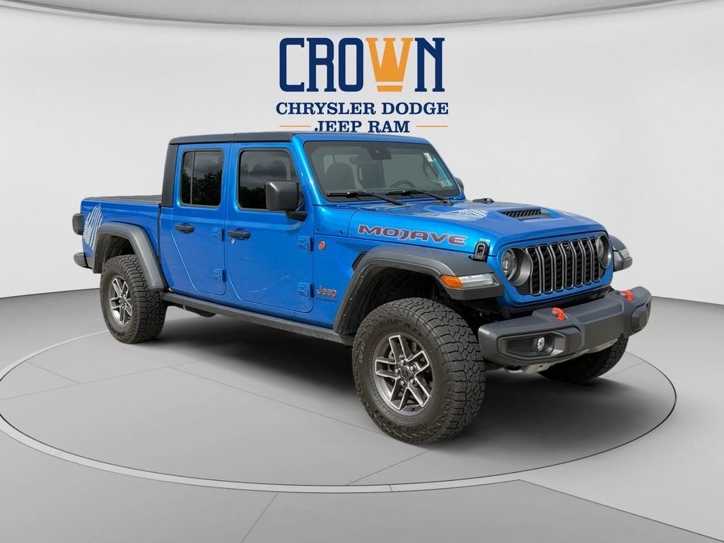 2024 Jeep Gladiator Mojave in Hydro Blue Pearlcoat — front three-quarter view