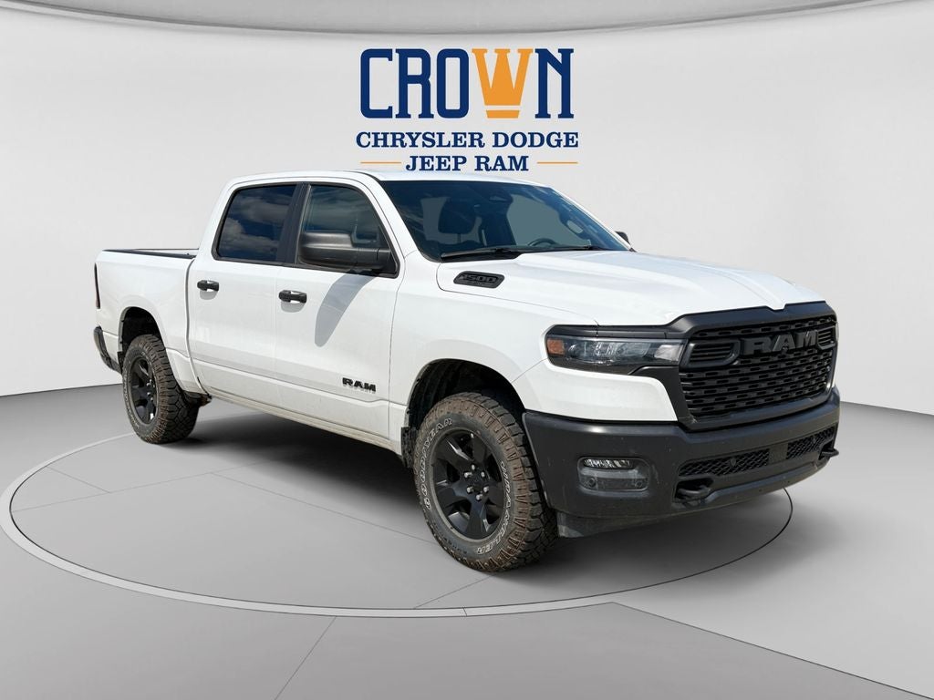 2025 RAM 1500 Warlock in Bright White Clearcoat — front three-quarter view