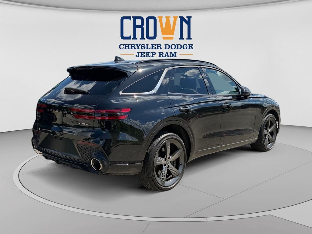2024 Genesis GV70 — rear three-quarter view