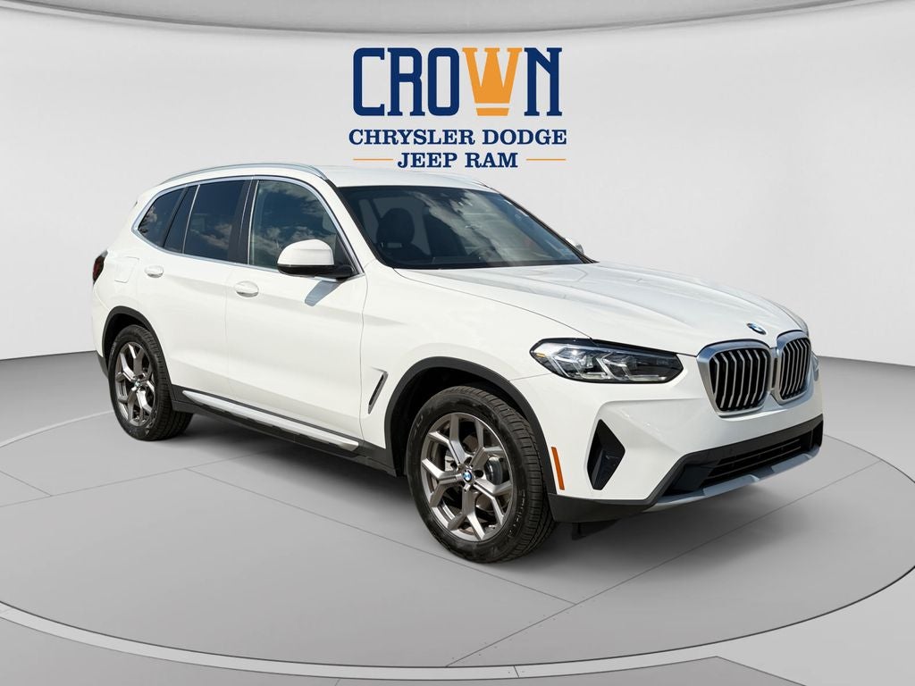 2022 BMW X3 xDrive30i in Alpine White — front three-quarter view