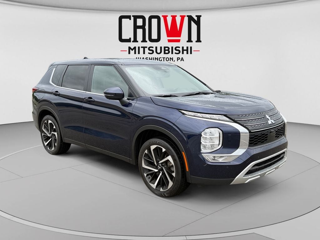 2024 Mitsubishi Outlander SE in Blue — front three-quarter view