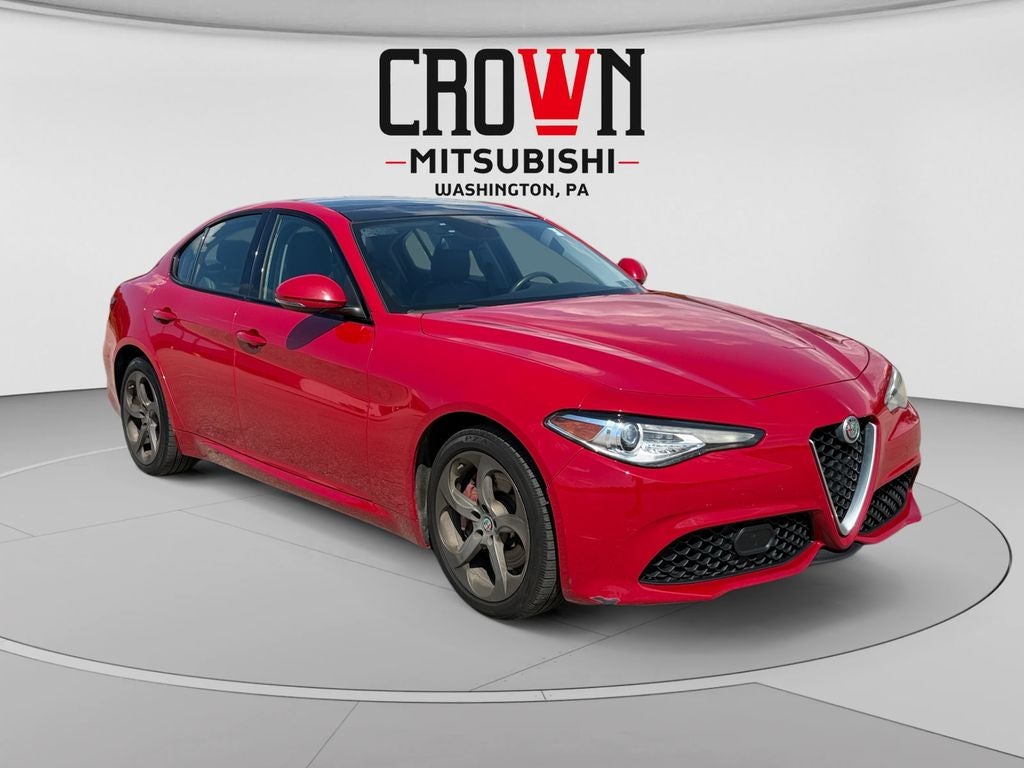 2017 Alfa Romeo Giulia Base in Rosso Alfa — front three-quarter view